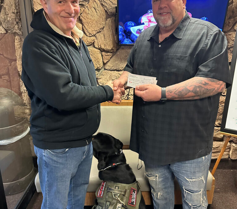 Mr. Ray Eckert donated $10,000 to Pawsitive for Heroes program