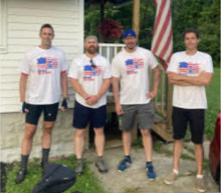 Photo of the four 100 mile riders: Drew, Kurtiss, Jay, and Nick.